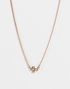 Allsaints Small Cross Pendent Necklace In Brass-gold
