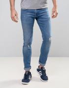 Redefined Rebel Slim Jeans With Distressing In Mid Wash Blue - Blue