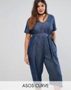 Asos Curve Denim Jumpsuit In Dark Wash Blue With Belt - Blue