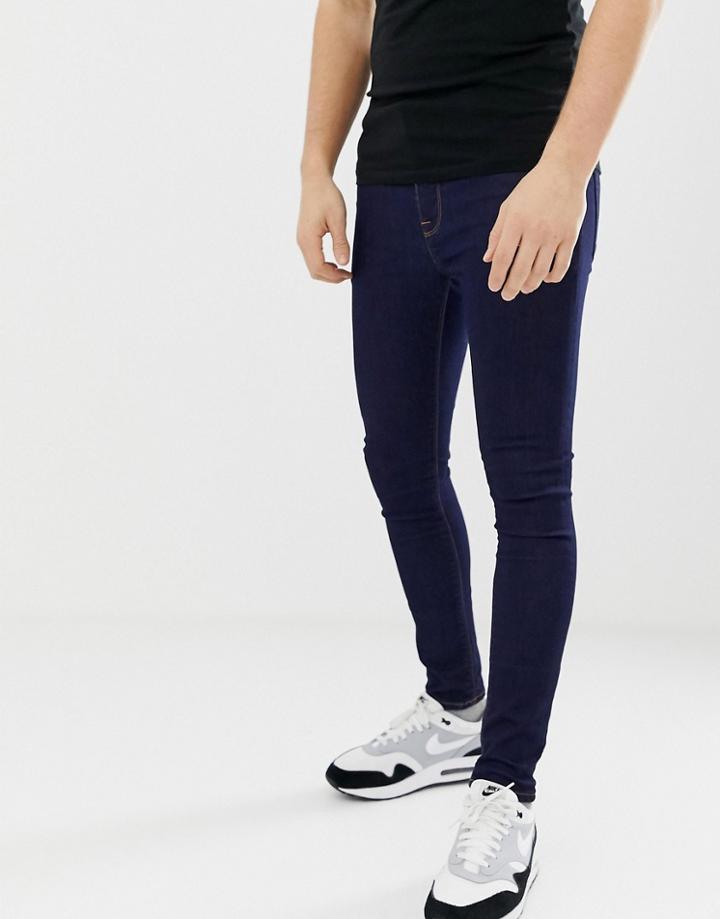 Asos Design Spray On Jeans In Power Stretch Denim In Indigo - Blue