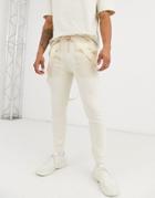 Asos Design Skinny Jersey Sweatpants With Straps In Off White Utility-beige