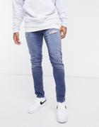 Asos Design Skinny Jeans In Dusty Blue Wash With Abrasions
