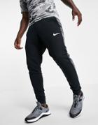 Nike Training Camo Tapered Sweatpants In Black