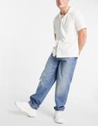 Asos Design Cone Mill Denim Baggy Fit 'american Classic' Jeans In Vintage Mid Wash Blue With Destroyed Hem-blues