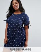 Yumi Plus Skater Dress With Bow Sleeve In Bird Print With Belt - Navy