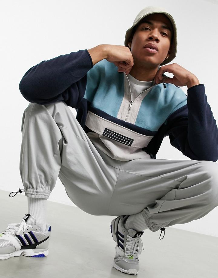 Asos Unrvlld Spply Oversized Polar Fleece Half Zip Sweatshirt With Map Pocket-navy