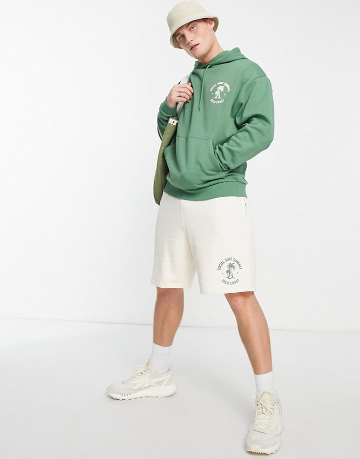 Asos Design Oversized Jersey Shorts In Beige With Surfing Logo Print - Part Of A Set-neutral