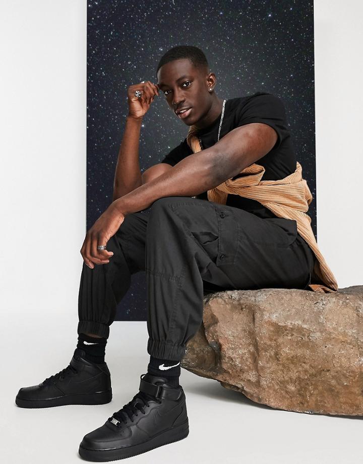 Asos Design Tapered Washed Cargo Pants With Elastic Waist In Black