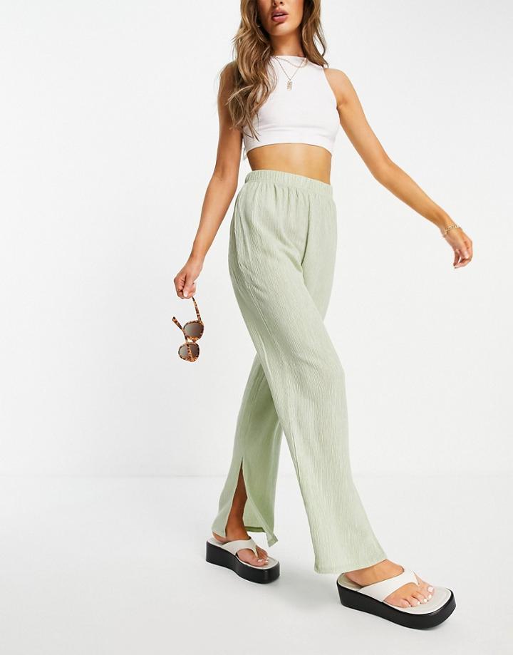 Mango Wide Leg Plisse Pants With Split In Sage-green