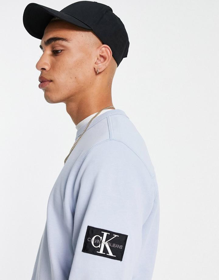 Calvin Klein Jeans Monogram Badge Sweatshirt In Light Blue