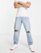 Asos Design Baggy Jeans In Vintage Light Wash With Knee Rips-blues