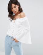 Parisian Off Shoulder Top With Flare Sleeves And Lace Up Front - White