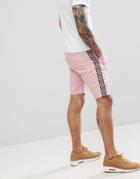 Asos Design Slim Shorts In Pastel Pink With Geo-tribal Side Tape - Pink