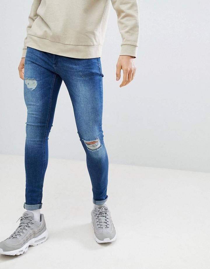 Criminal Damage Muscle Fit Jeans In Dark Blue - Blue