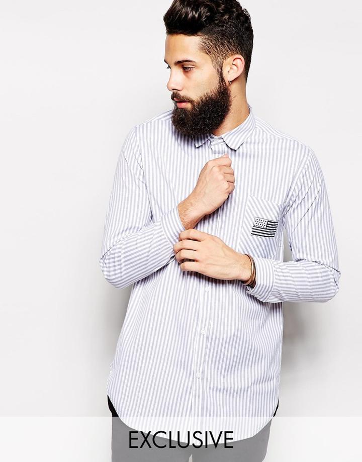 Reclaimed Vintage Longline Dip Back Shirt With Flag In Stripe - Blue