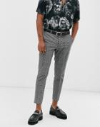 Twisted Tailor Tapered Cropped Checked Pants With Polka Dot Flock In Black
