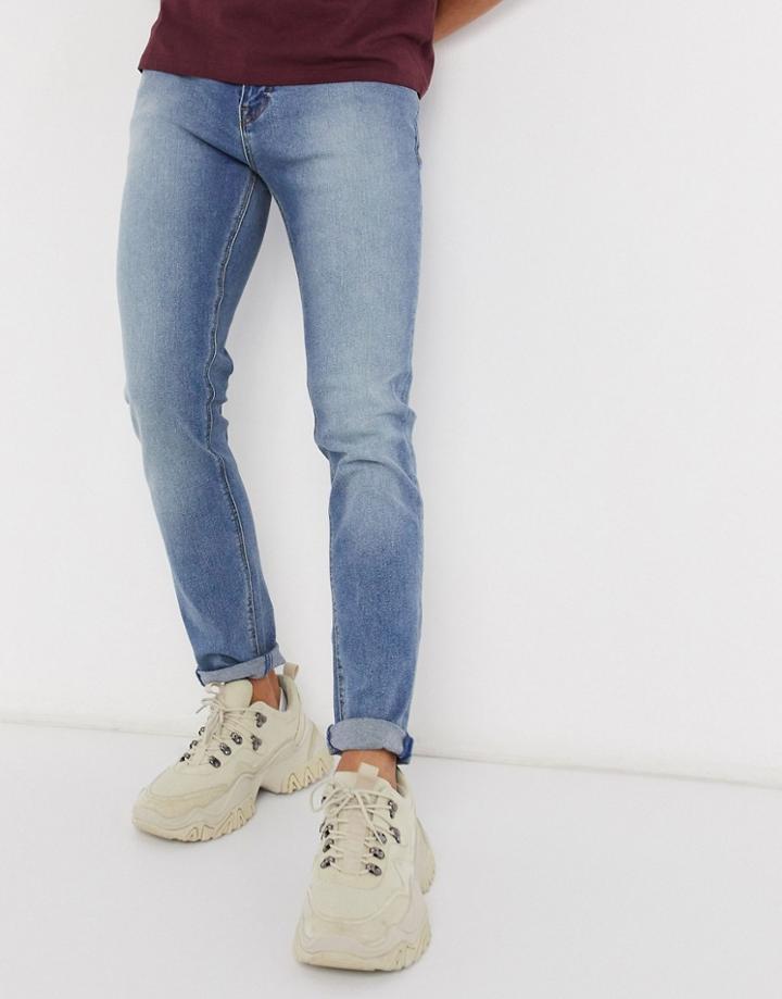 Asos Design Skinny Jeans In Classic Mid Wash Blue-blues
