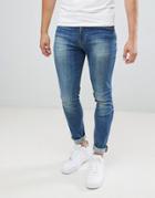 Asos Design Skinny Jeans In Mid Blue Wash - Blue