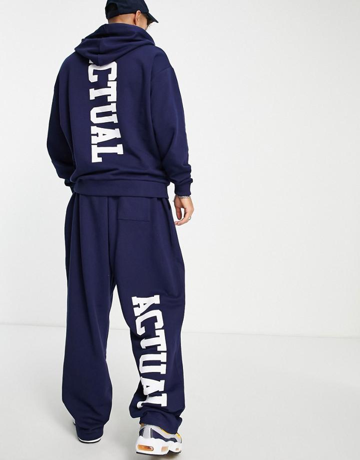 Asos Actual Relaxed Sweatpants With Back Leg Logo Print And Printed Drawcords In Blue - Part Of A Set-blues