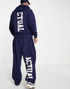 Asos Actual Relaxed Sweatpants With Back Leg Logo Print And Printed Drawcords In Blue - Part Of A Set-blues