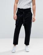 Asos Tapered Pants With Paper Bag Waist In Washed Black - Black