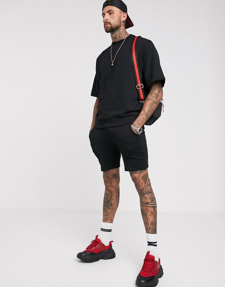 Asos Design Short Sleeves Tracksuit With Shorter Length Shorts In Black