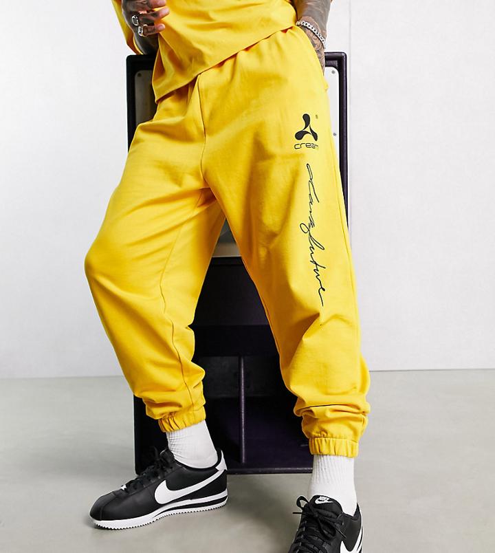 Asos Dark Future X Cream Relaxed Sweatpants With Logo Print In Yellow - Part Of A Set