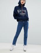 Tommy Jeans High Rise Slim Izzy Jeans With Distressed Hem - Blue