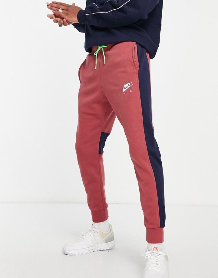 Nike Air Cuffed Fleece Sweatpants In Dusty Brown/navy
