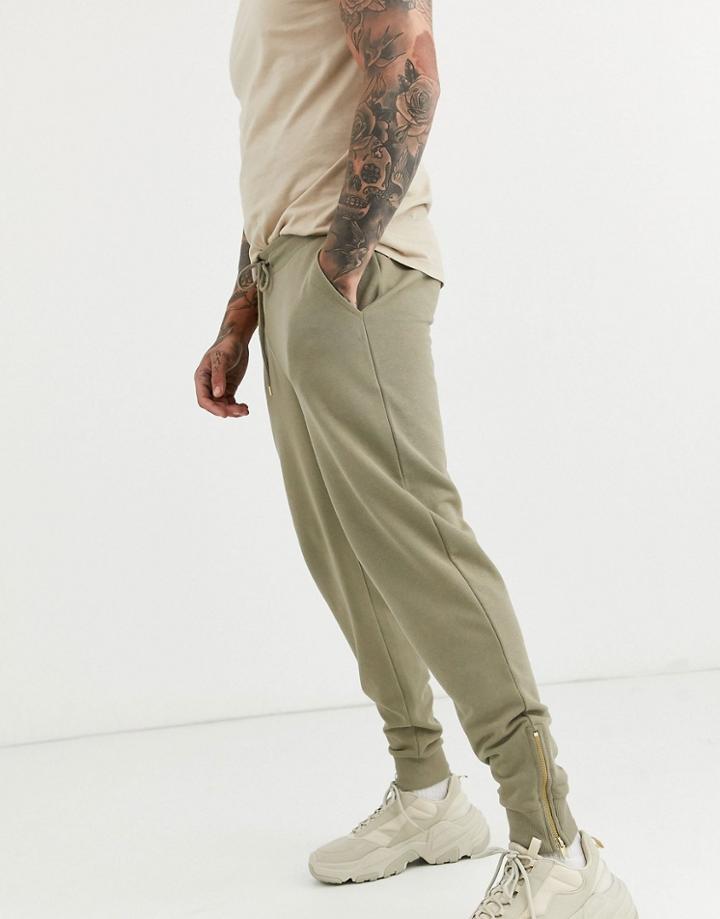 Asos Design Tapered Sweatpants In Light Khaki With Gold Zip Cuffs-green