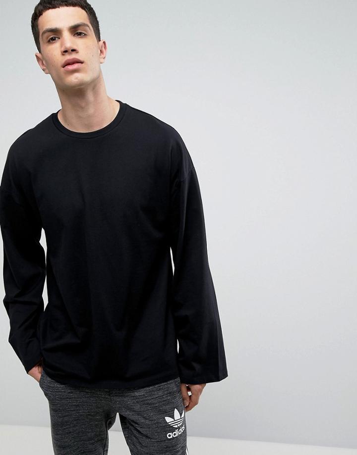 Asos Oversized Long Sleeve T-shirt In Heavy Jersey With Wide Sleeve In Black - Black