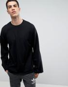 Asos Oversized Long Sleeve T-shirt In Heavy Jersey With Wide Sleeve In Black - Black