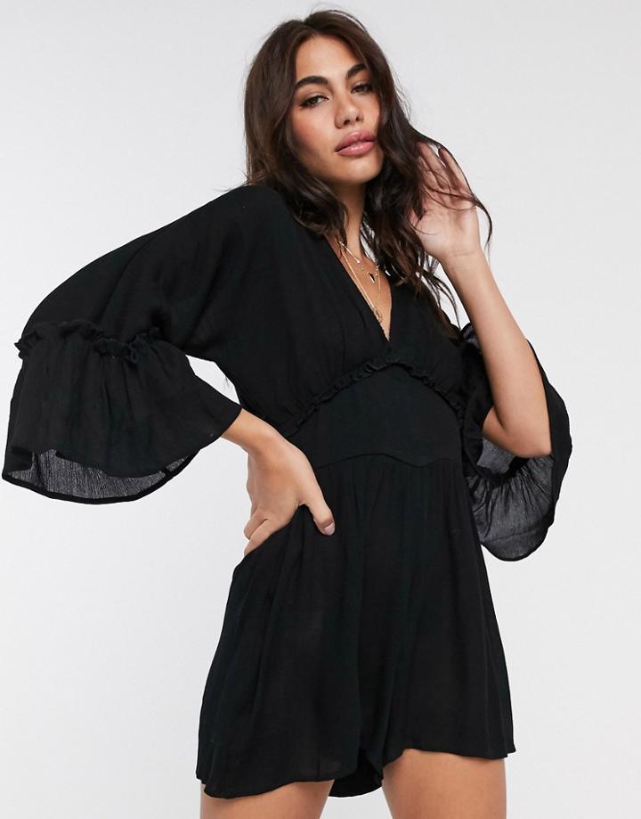 Asos Design Swing Romper With Frill Sleeve In Crinkle In Black