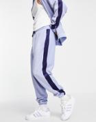Asos Design Set Oversized Sweatpants In Blue Ribbed Velour With Side Stripe-blues