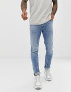 Diesel Tepphar Slim Carrot Fit Jeans In 081al Light Wash - Blue