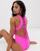 Asos Design Recycled Lace Up Back Plunge Swimsuit With Ruched Bum In Shocking Neon Pink - Pink