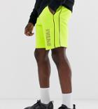 Asos Design Tall Jersey Shorts In Washed Neon With Text Print - Yellow