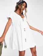 Asos Design Short Sleeve Mini Smock Dress With Large Button Detail In White