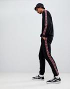 Asos Design Skinny Joggers With Geo-tribal Side Stripe - Black