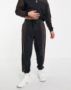 Asos Design Oversized Sweatpants With Revere Panels & Multi Placement Print In Black - Part Of A Set