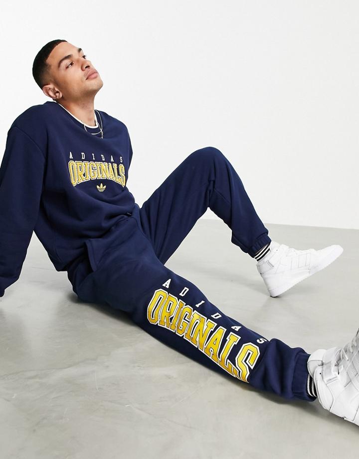 Adidas Originals 'retro Revival' Logo Graphics Sweatpants In Navy