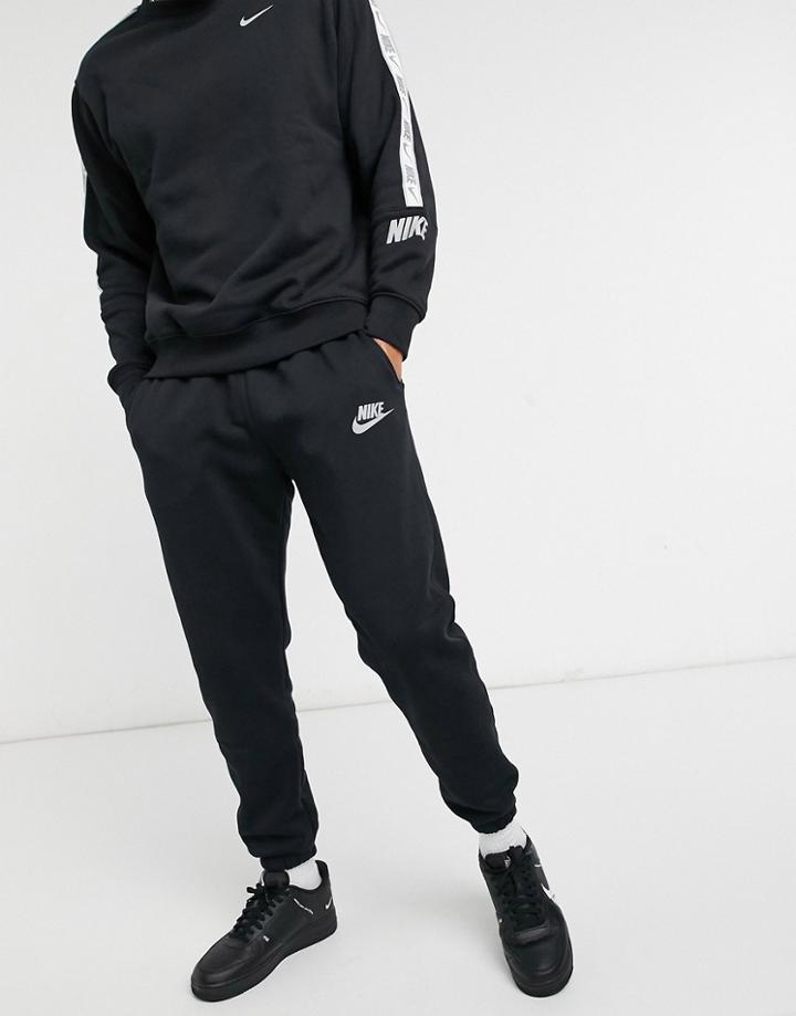 Nike Club Fleece Sweatpants With Reflective Logo In Black