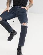 Asos Design Skinny Jeans In Overdyed Black With Knee Rips And Raw Hem - Black