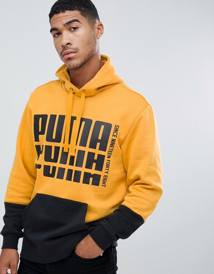 Puma Pullover Hoodie With Stacked Logo In Yellow - Yellow