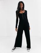 Asos Design Rib Jumpsuit With Button Front And Long Sleeves-black