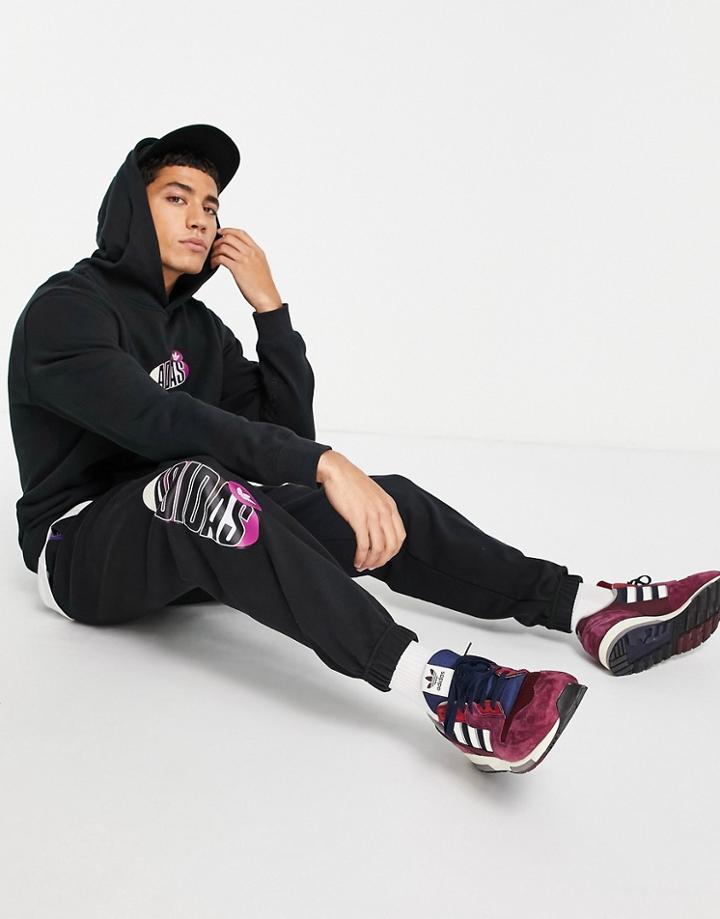 Adidas Originals 'area 33' Tapered Sweatpants In Black