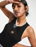 Asos Design Ribbed Tank Top With Taco Embroidery In Black