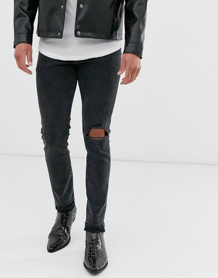 Asos Design 12.5oz Skinny Jeans In Washed Black With Knee Rip And Destroyed Hem