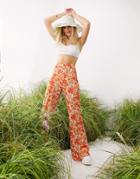 Asos Design Retro Floral Flare Pants In Orange