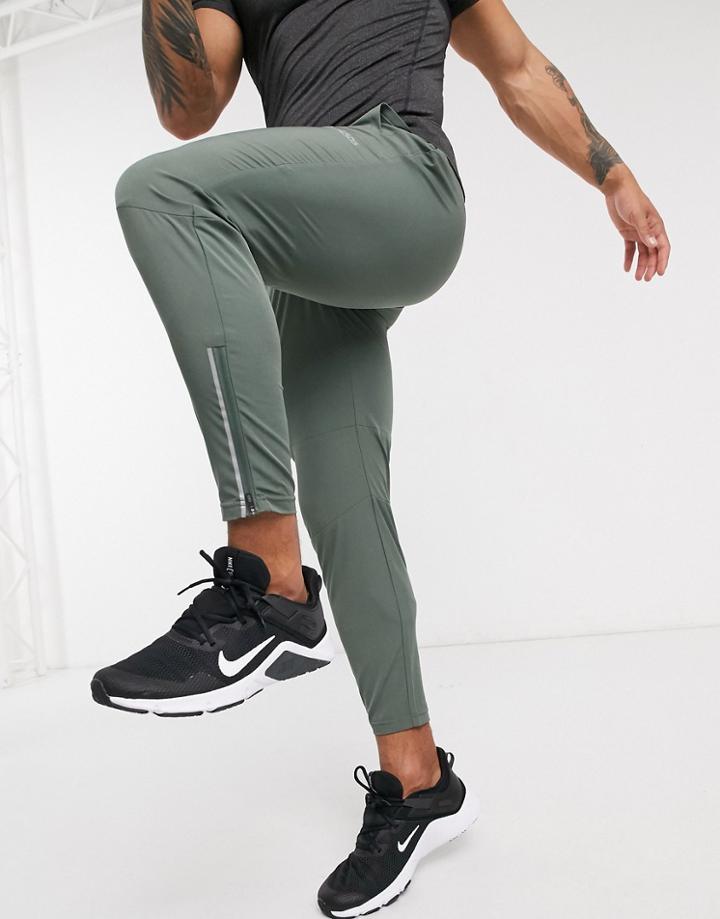 Asos 4505 Woven Skinny Tapered Running Sweatpants With Reflective Zip Detail In Khaki-green